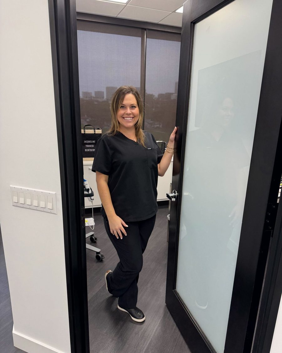 A treatment room at the practice, seen through its glass door